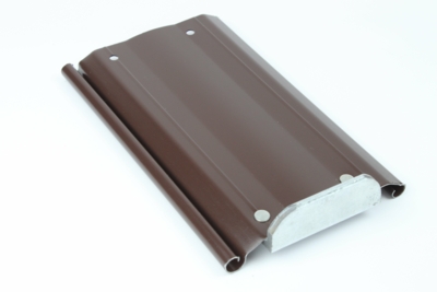 Pre-lacquered sheet in original brown before molding. Shade close to Ral 8017.
